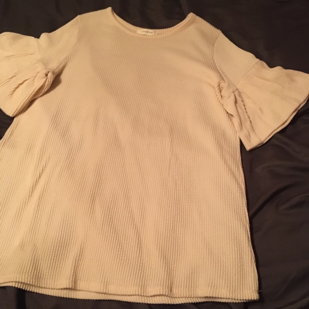 Ivory ribbed woman’s blouse